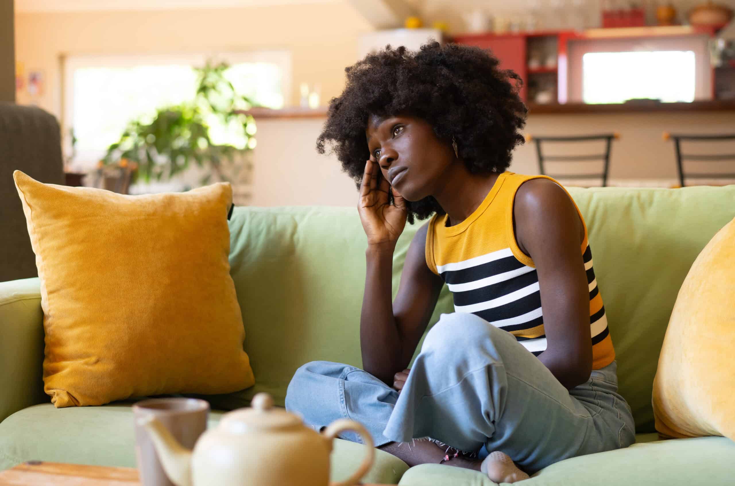 woman stressed on the couch