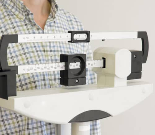 Man standing on a scale