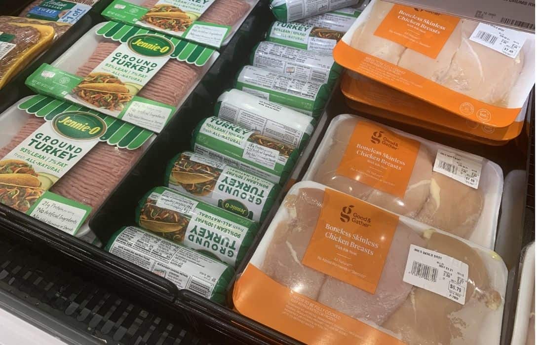 Skinless chicken breast and ground turkey on shelf