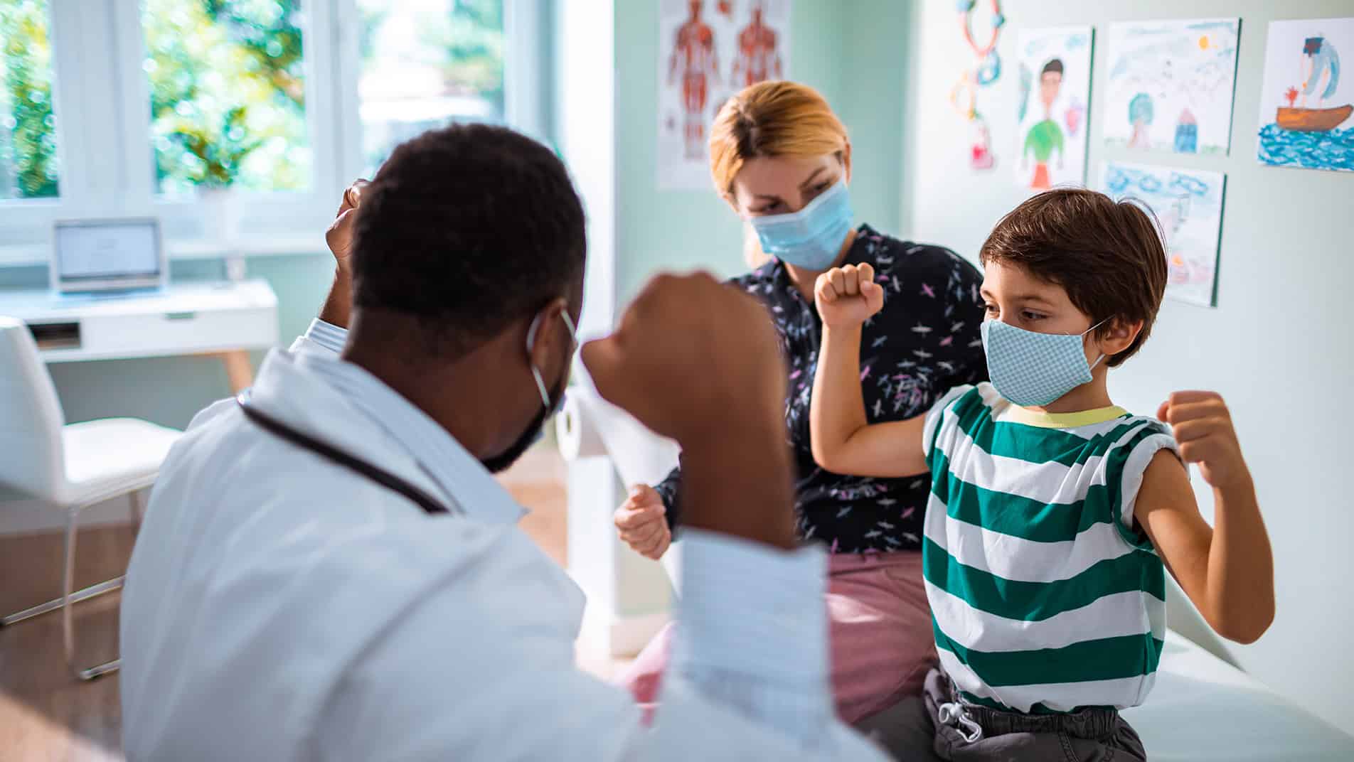 Doctor playing with kid patient