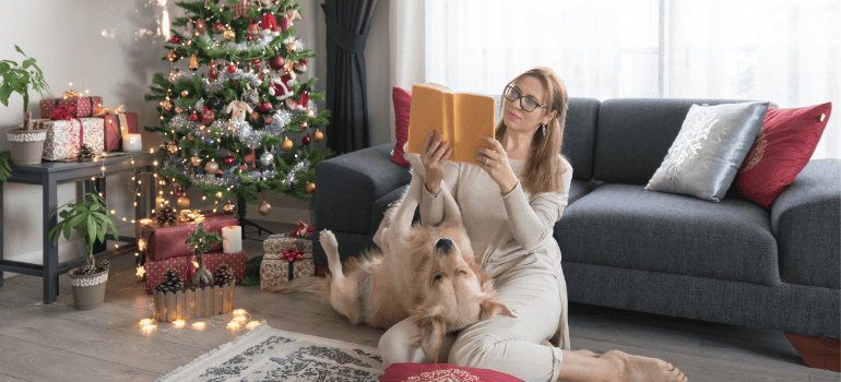 Person reading with their dog