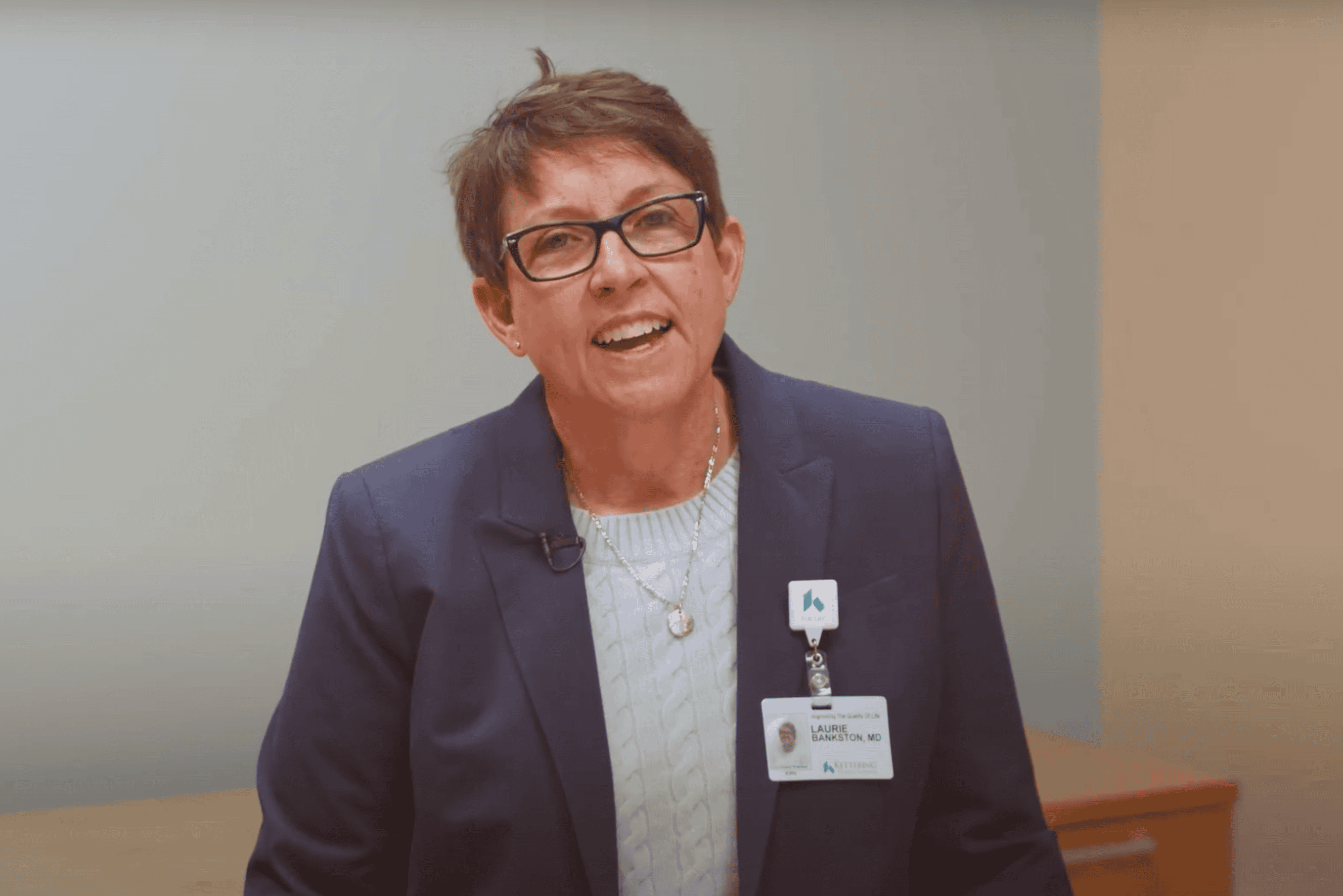 Dr. Laurie Bankston smiling and talking