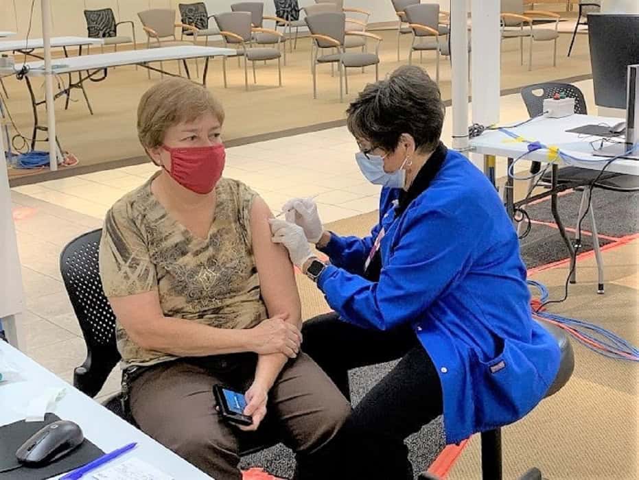 Mary getting covid shot