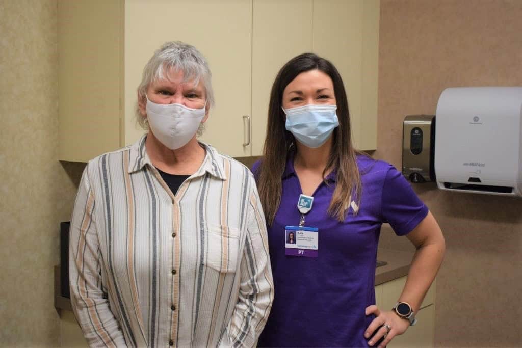 Robyn poses with her pelvic floor therapist Kate