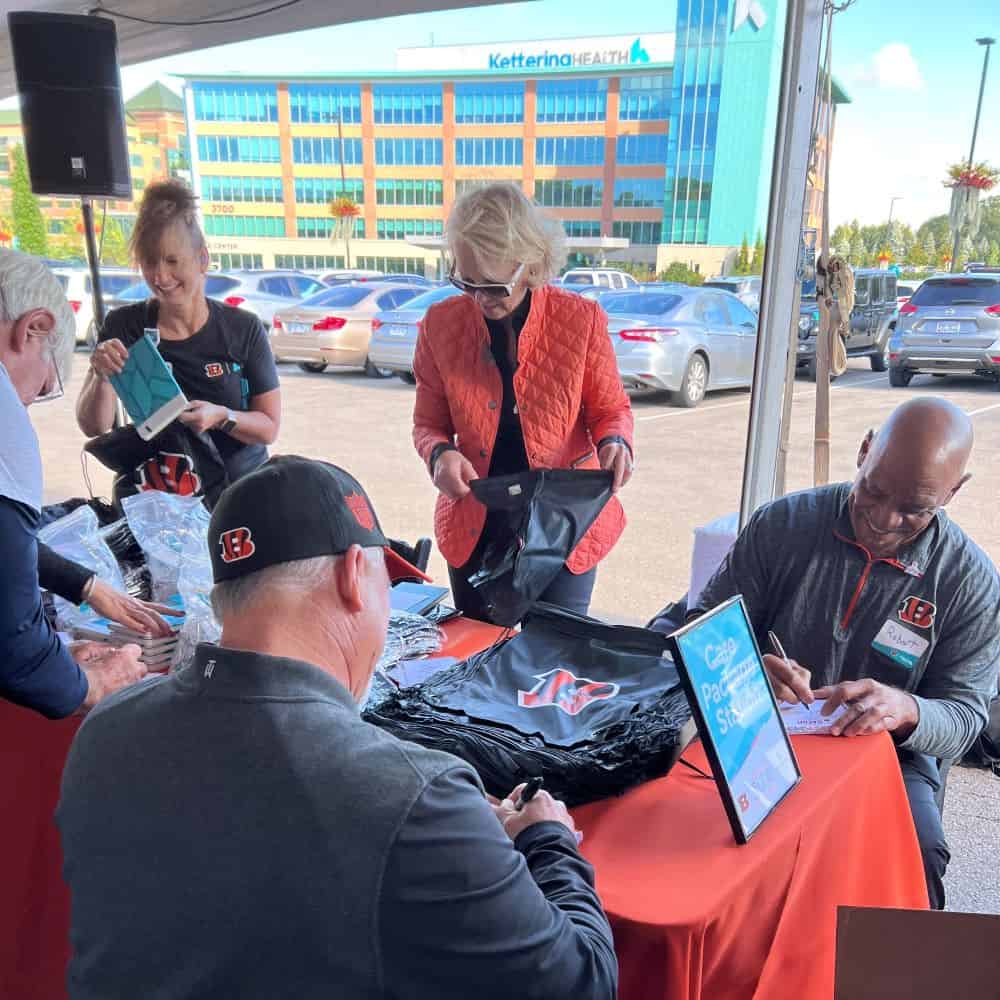 Cincinnati Bengals legends pack care packages at Kettering Health Cancer Center