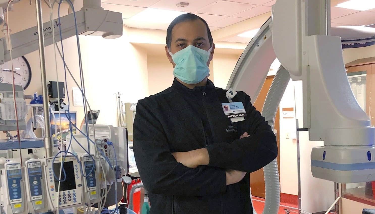 Dr. Bhirud poses in lab