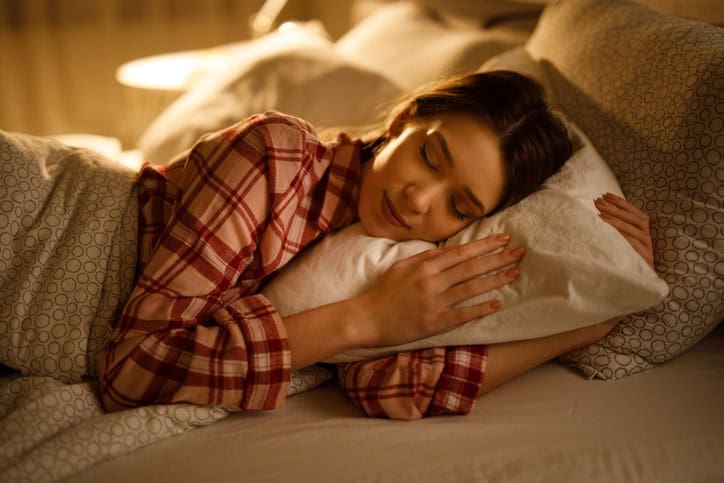 Woman sleeping in bed