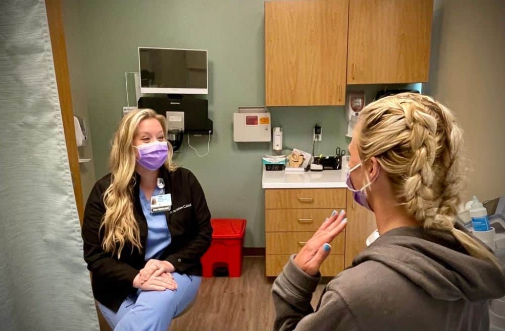 Dr. Caldwell OB-GYN talks to patient