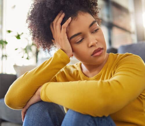young woman looking sad