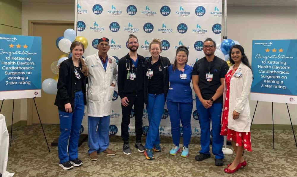 Doctors pose for a picture at their celebration for their three star rating for CABG procedures