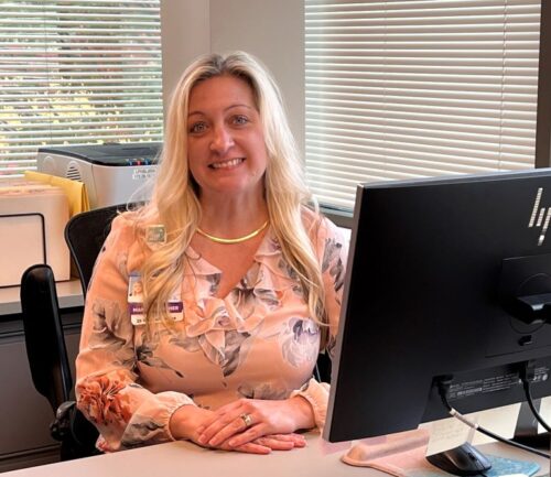 Deanne Rose smiling at camera