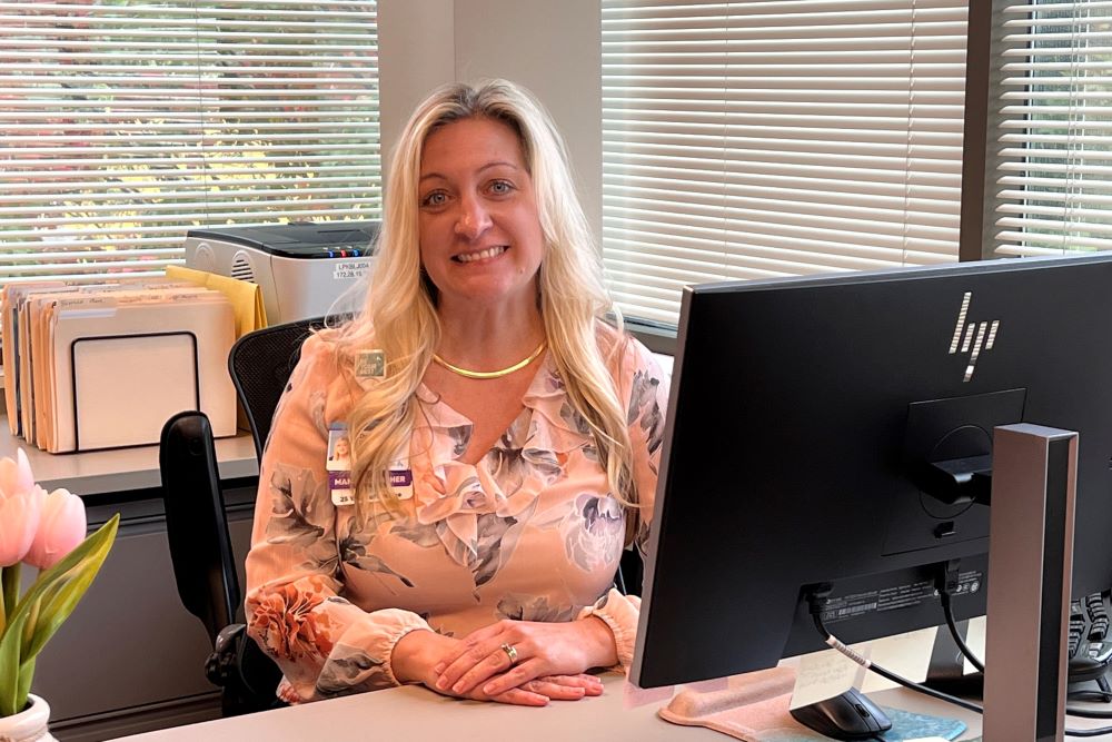 Deanne Rose smiling at camera