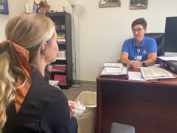 Julie Manuel with patient