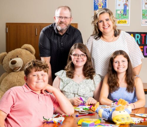 The Williamson family poses in the CLIMB program