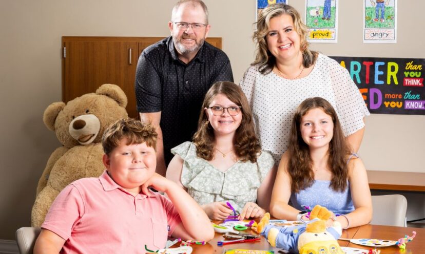 The Williamson family poses in the CLIMB program