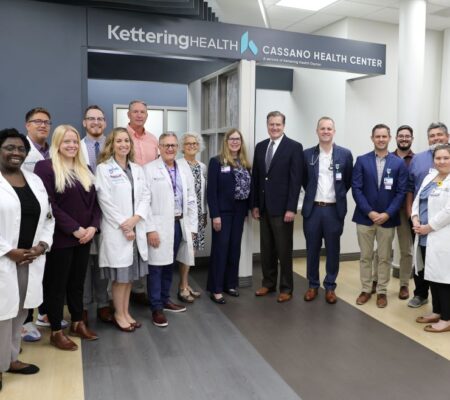People smiling in the Cassano Health Center