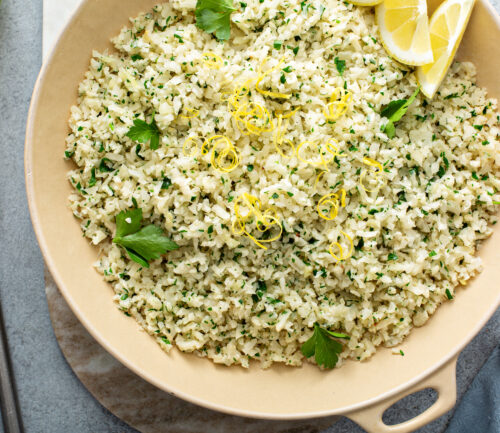Lemon herb cauliflower rice cooked in a pan