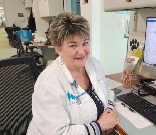 Kay Finch at her desk