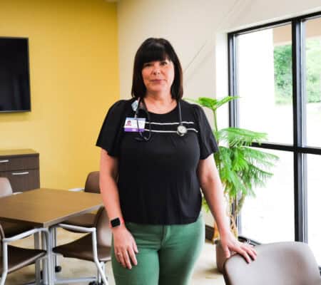 Lori Zwickel smiling at the camera