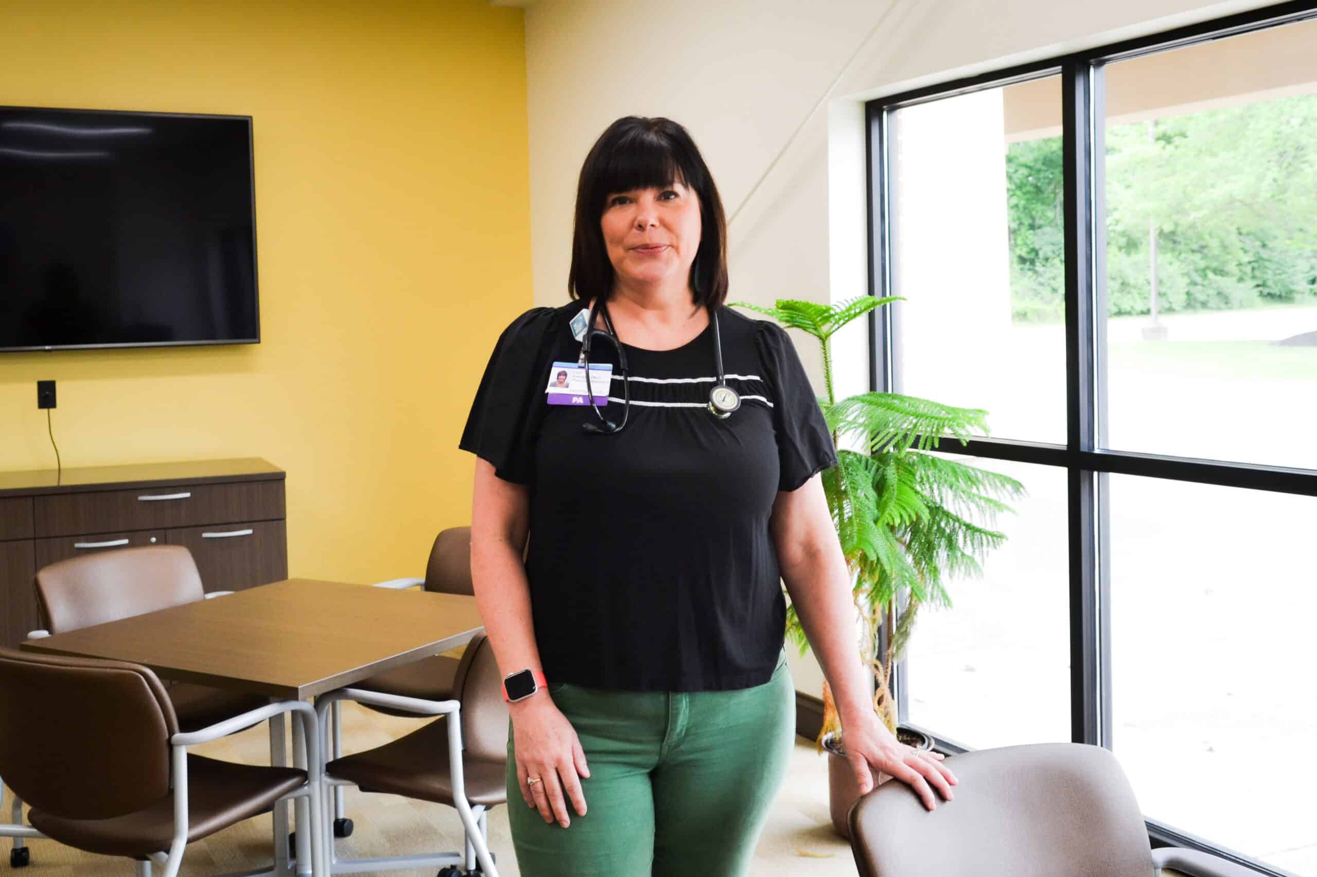 Lori Zwickel smiling at the camera