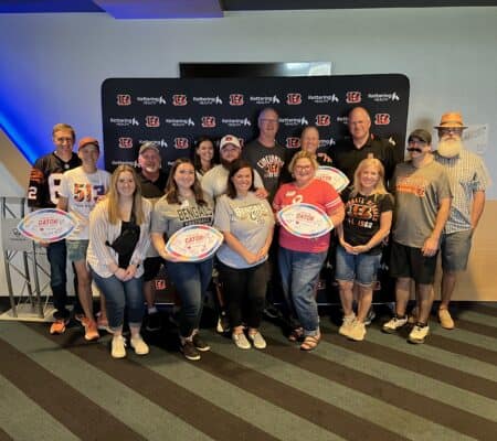 Cancer patient survivors and patients at Topgolf with Bengals Legends