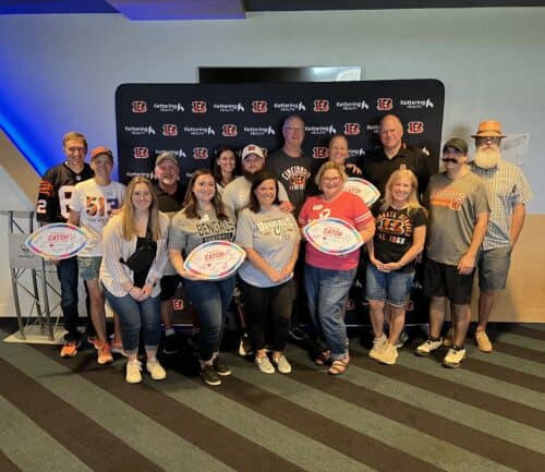 Cancer patient survivors and patients at Topgolf with Bengals Legends