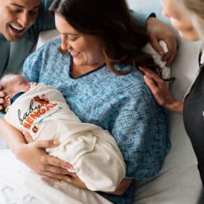 Bengals newborn with family