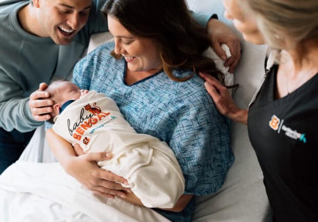 Bengals newborn with family