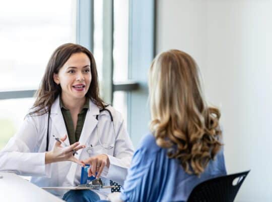Doctor giving advice to patient