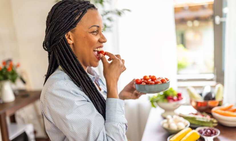 Woman eating fruits and vegetables