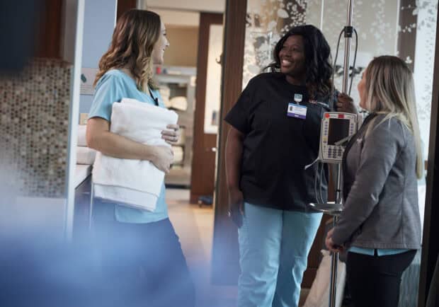 Nurses talking in the hallway