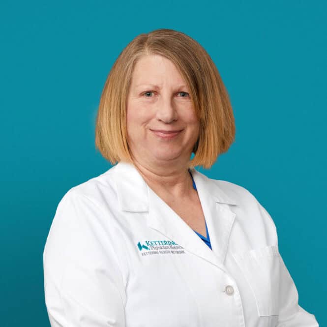Professional headshot of Alicia M. Buterbaugh, RD in white Kettering Health coat