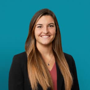 Professional headshot of Gabrielle LaSala, PA-C in black blazer against teal background