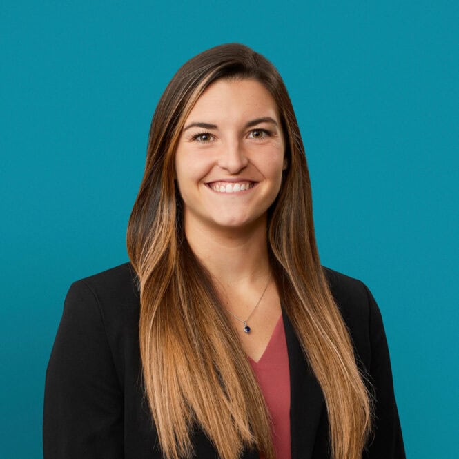 Professional headshot of Gabrielle LaSala, PA-C in black blazer against teal background