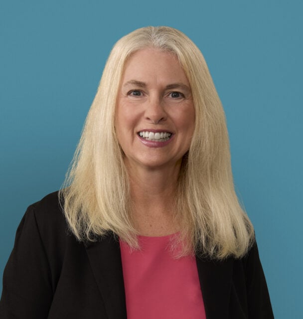 Professional headshot of Gail Griffith, RN, smiling in black blazer and pink top.