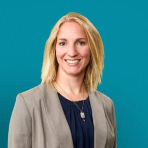 Professional headshot of Jill A. O'Connor, PA-C in gray blazer against teal background