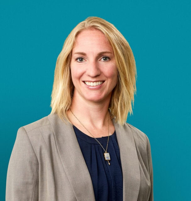 Professional headshot of Jill A. O'Connor, PA-C in gray blazer against teal background