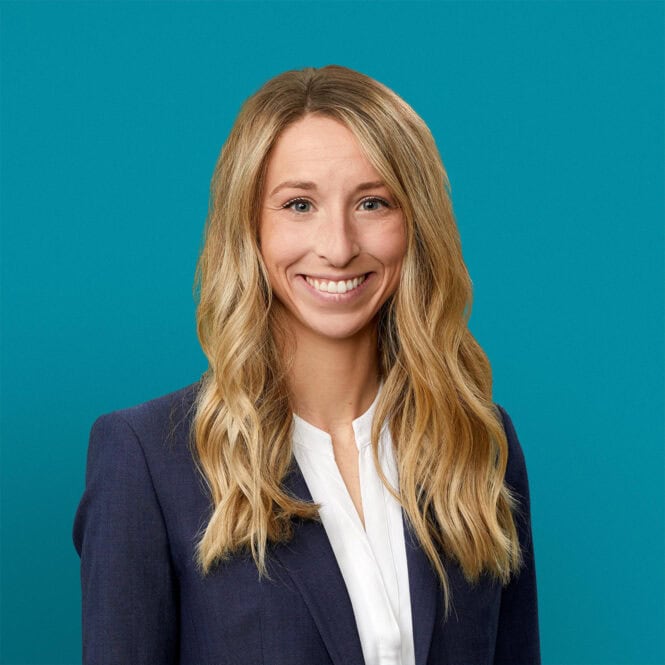 Professional headshot of Lyndsey S. Filbrun, PA-C in navy blazer and white shirt