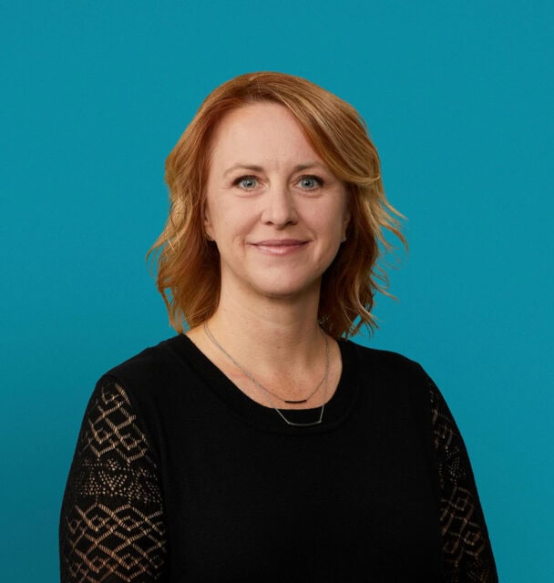 Professional headshot of Verity C. Digel, PA-C against turquoise background