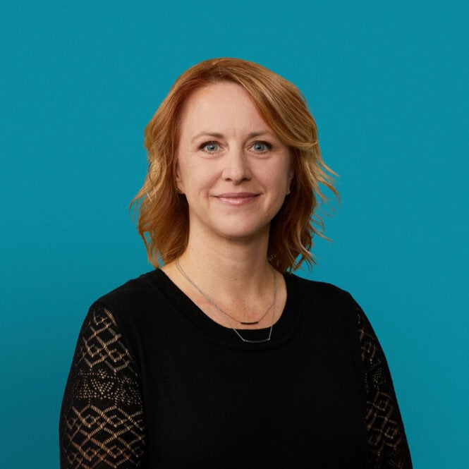 Professional headshot of Verity C. Digel, PA-C against turquoise background