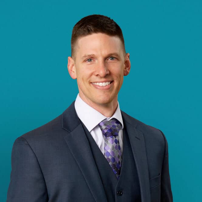 Professional headshot of William G. Alter, DO in dark suit against teal background