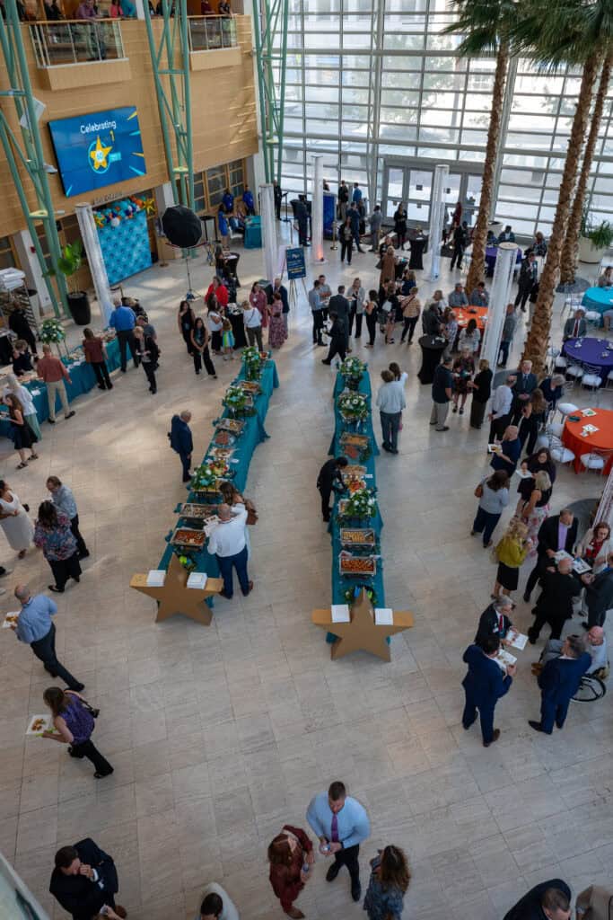 Attendees enjoying An Evening With Our Stars reception